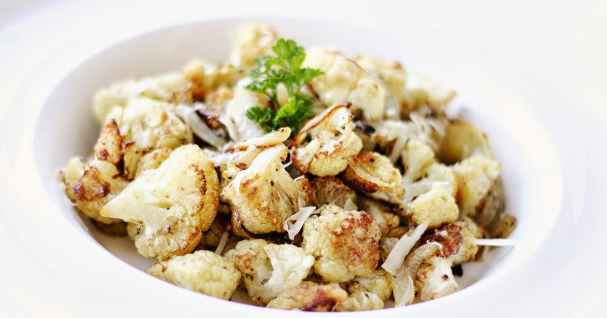 Parmesan roasted cauliflower in a white bowl